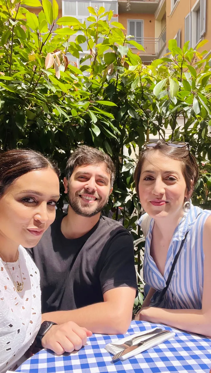 A small group of creatives meeting for lunch in their city