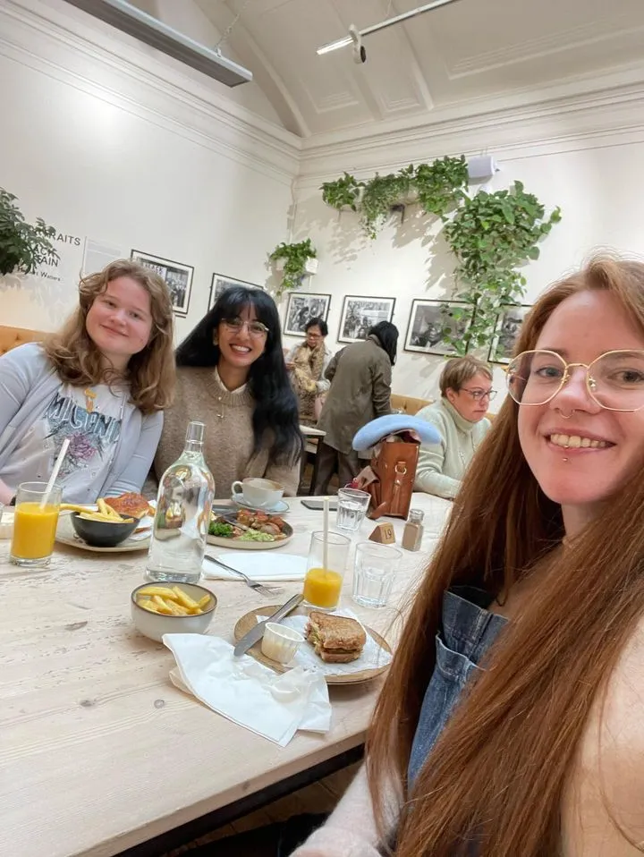 A group of creative professionals connecting over a relaxed lunch