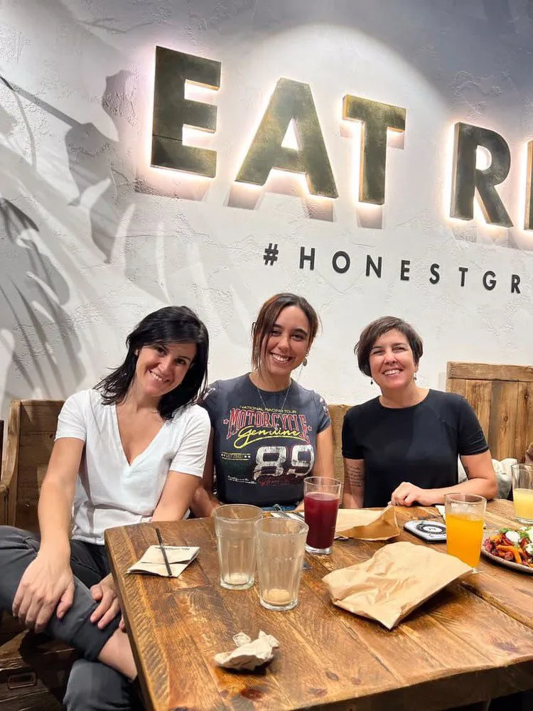 A small group of creatives meeting for lunch in their city