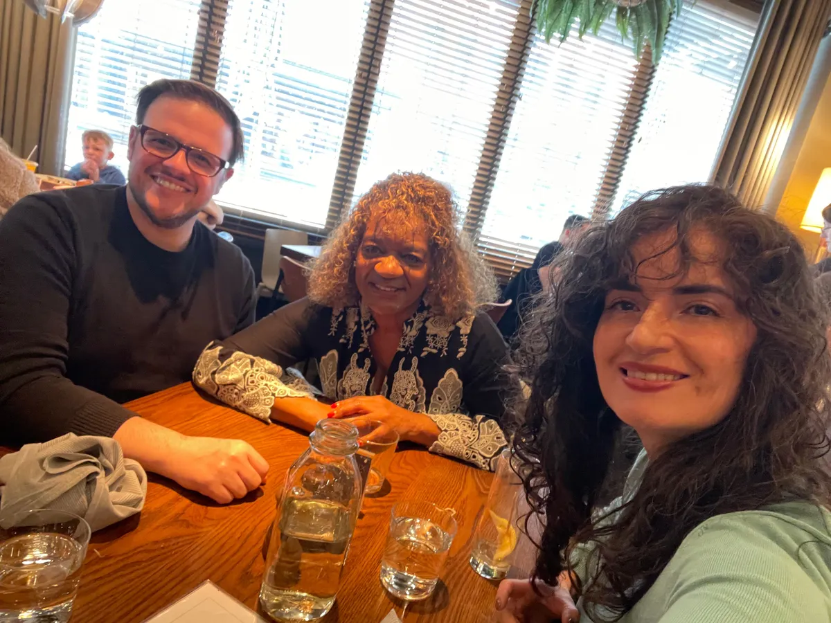 A group of creative professionals connecting over a relaxed lunch