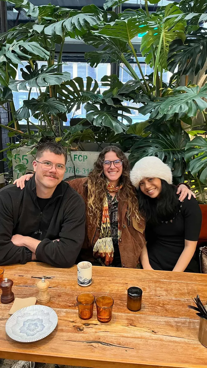 A group of creative professionals connecting over a relaxed lunch