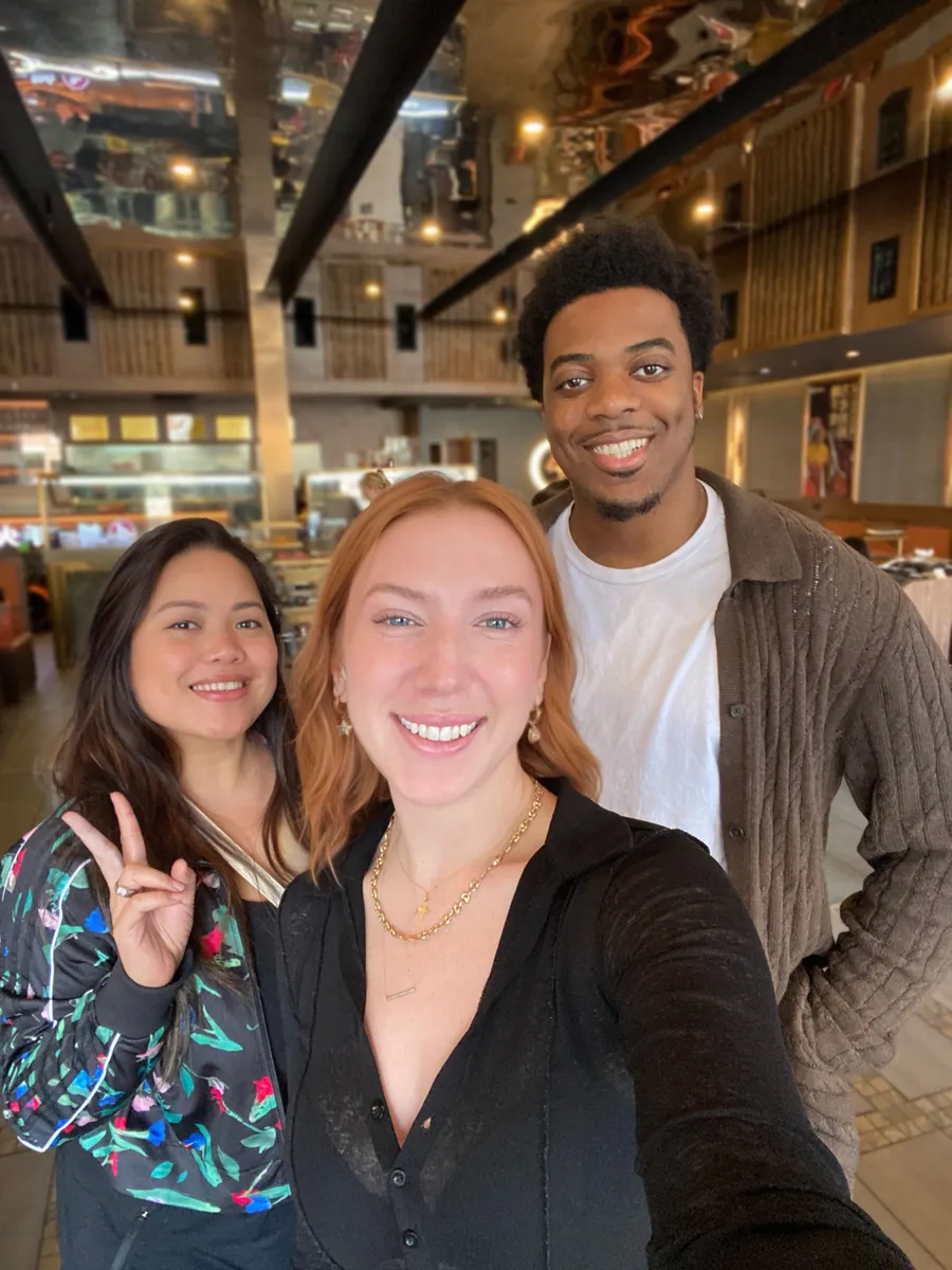A group of creative professionals connecting over a relaxed lunch