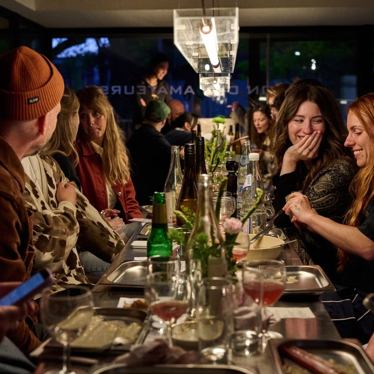 Creatives having dinner in candle light