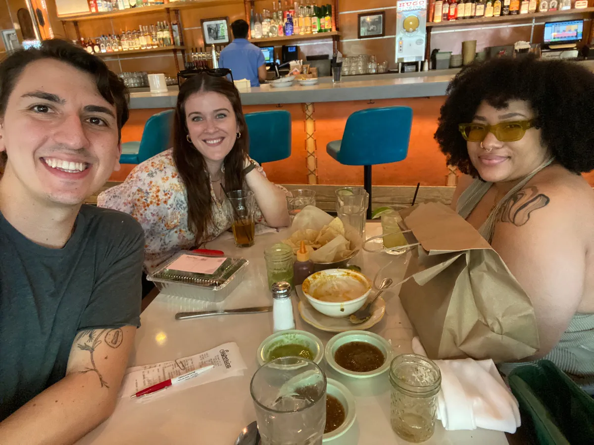 A group of creative professionals connecting over a relaxed lunch