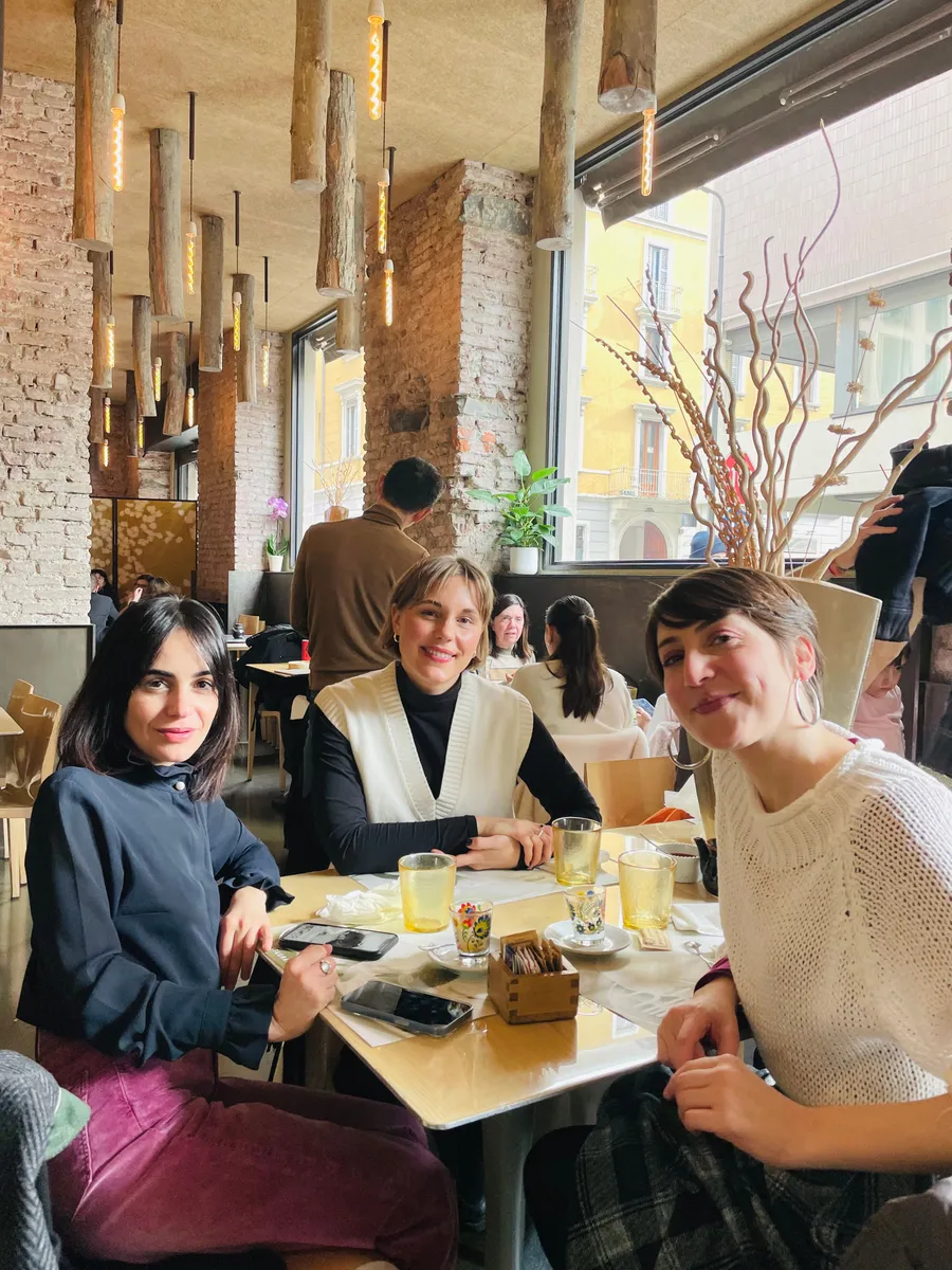 A group of creative professionals connecting over a relaxed lunch