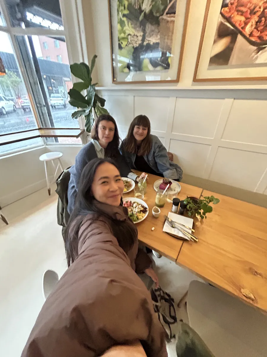 A group of creative professionals connecting over a relaxed lunch