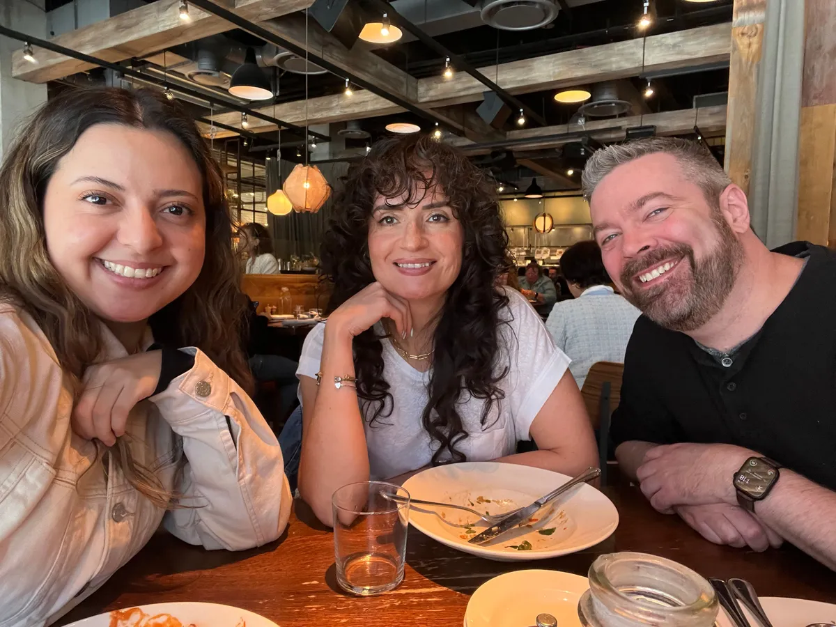 A small group of creatives meeting for lunch in their city