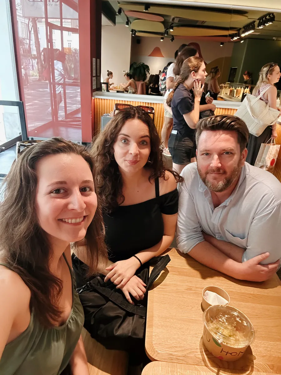 A small group of creatives meeting for lunch in their city