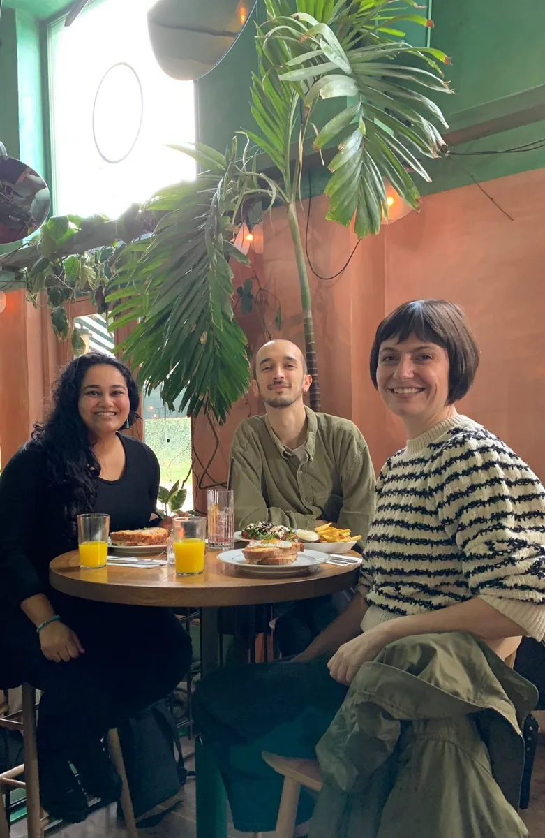 Creatives meeting and talking over lunch