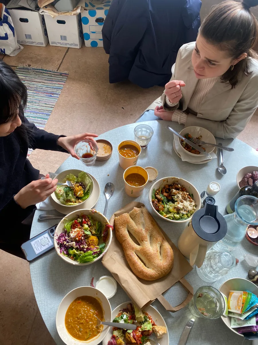 A group of creative professionals connecting over a relaxed lunch