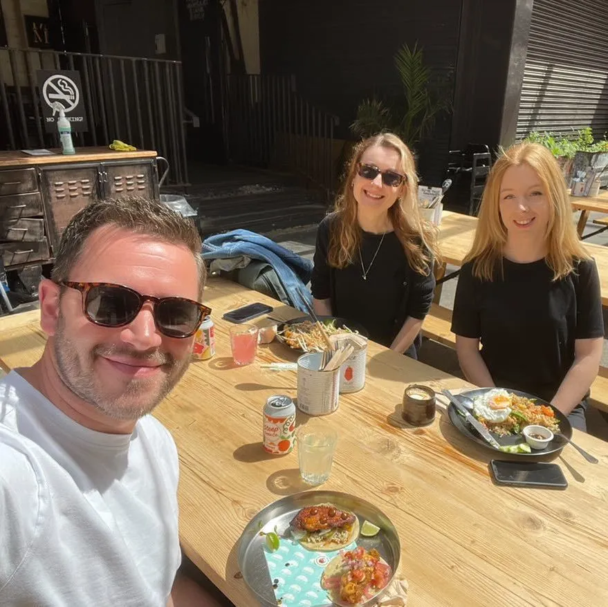A group of creative professionals connecting over a relaxed lunch